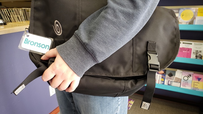 A person holding a bag